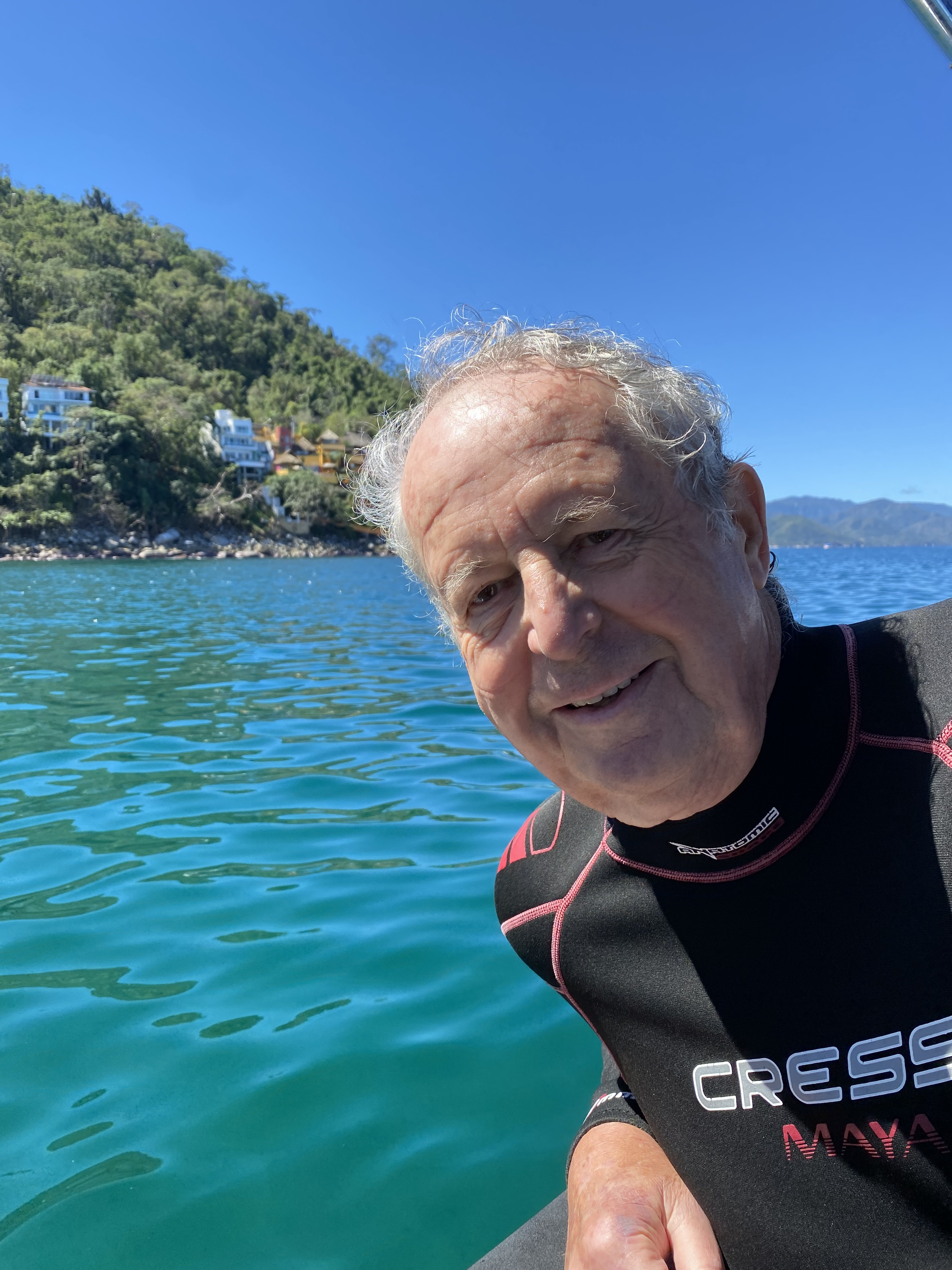 OHI patient posing in Banderas Bay.