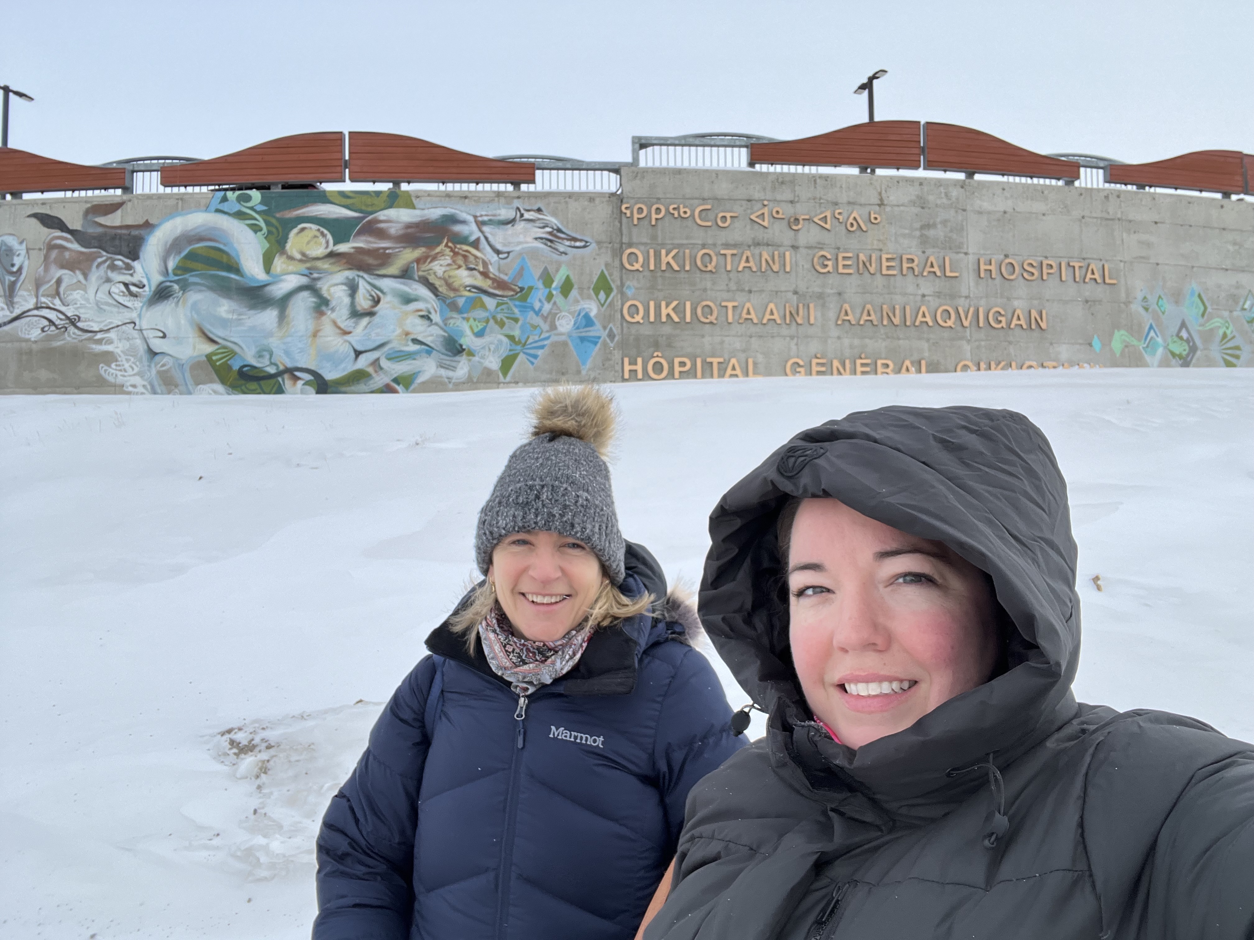 Jennifer Harris and Julie Sawyer outside Qikiqtani General Hospital.