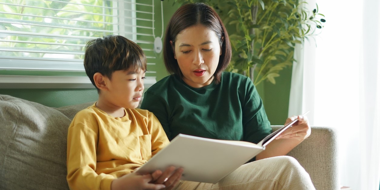 woman and child reading