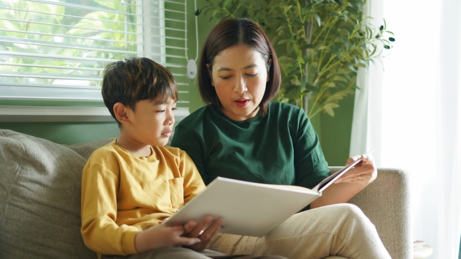 woman and child reading