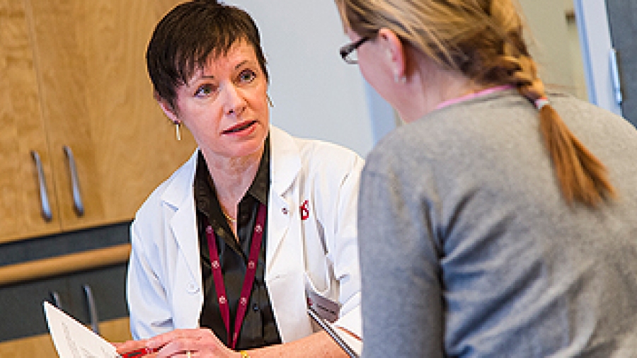 Photo of nurse consulting with a patient