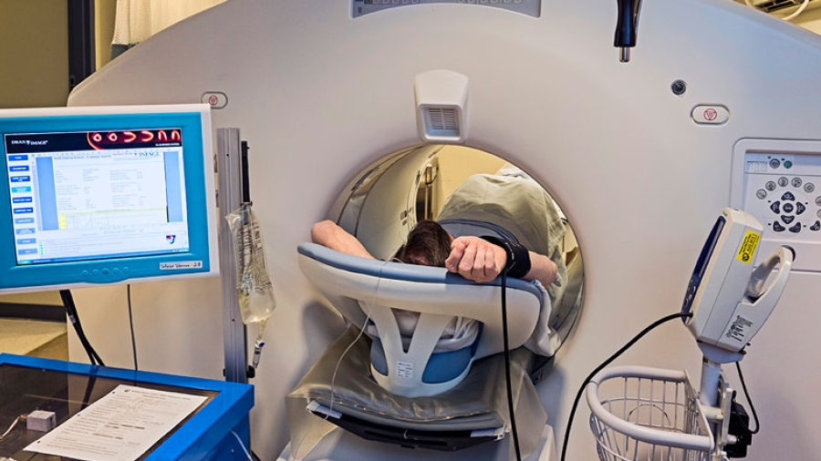 A patient inside a PET scan machine