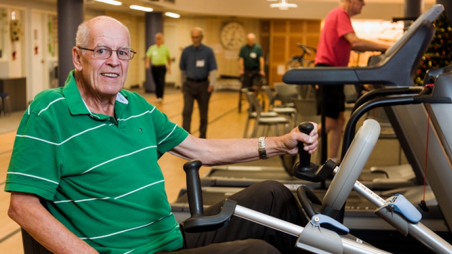 Cardiac rehabilitation patient on a stationary bicycle