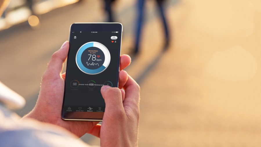 A smartphone being used to assess blood flow in arteries found in the wrist