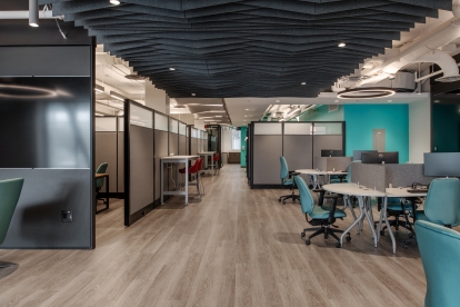 Offices branch out on either side of a long corridor, creating a network of interconnected spaces.