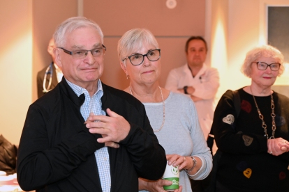 Dr. Martin Green reacts to remarks from Dr. Simon Hansom during a retirement ceremony held in his honour at the Ottawa Heart Institute.