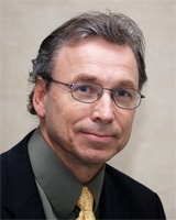 Dr. Michel Le May