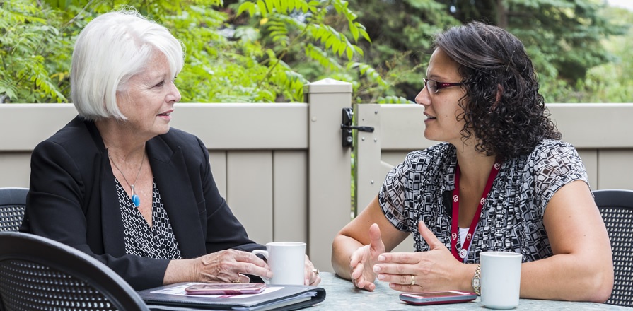 Roxy Hamilton (left), a group leader, talks with Women@Heart Program Lead Nadine Elias about how important it is for participants to share their thoughts and feelings with other women who have heart disease.